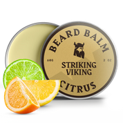 Citrus beard balm tin with lime and orange slice.