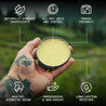 Citrus beard balm in a tin held outdoors, featuring natural ingredients, all-day hold, and travel-friendly benefits.