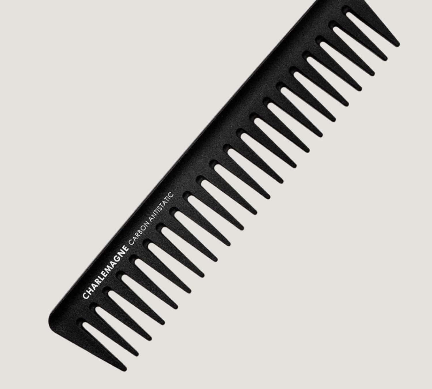 Black carbon fiber wide-tooth comb with antistatic, heat-resistant design for thick and curly hair detangling