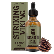 Striking Viking Cedarwood Beard Oil 2oz bottle with dropper and pine cone, all-natural organic formula for softening and moisturizing beard